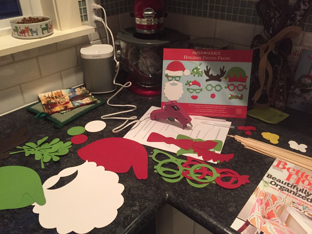 {Putting together our holiday photo props}