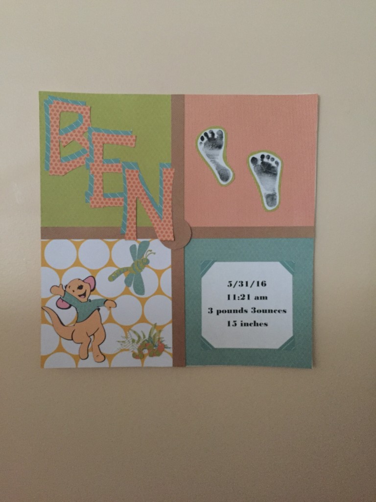 {one of the NICU or March of Dimes volunteers made this adorable sign for Ben right next to his bed. Those are his little footprints!}