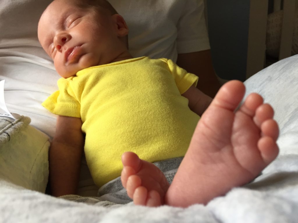 {Baby feet! He definitely has his mama's feet ;) }