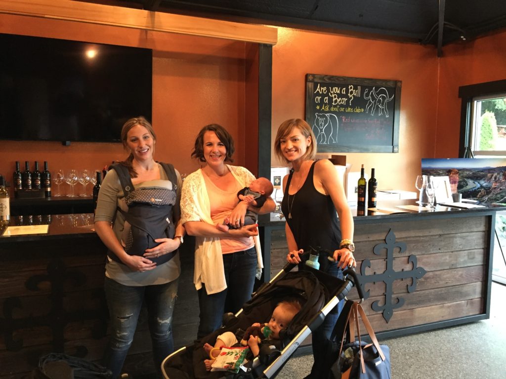 {Carrie, Mary and I took our babies out for lunch and wine yesterday afternoon in Woodinville. It was Ben's second trip to Woodinville, as a matter of fact! The girls and I were outnumbered by our babies, though, sadly, baby Oliver got cut off of the bottom of this picture - he was sharing the stroller with his brother.}
