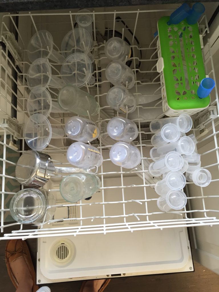 {Our dishwasher and counter have been overrun with bottles and pumping parts! One thing we thought might be contributing to Ben's fussiness during mealtime was the storage of milk. We're hoping to get to the bottom of feeding soon!}